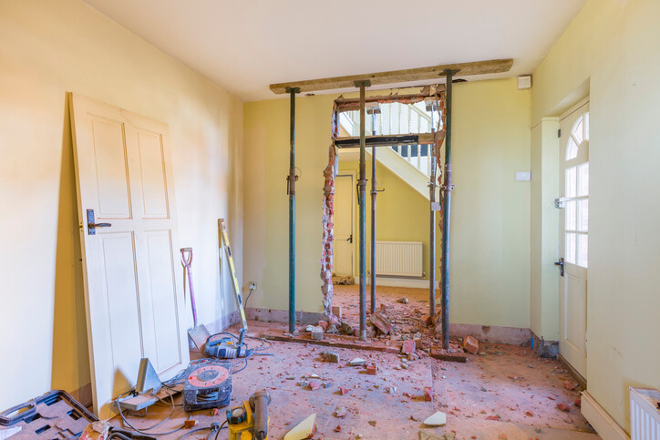 Ceiling being propped up for door replacement