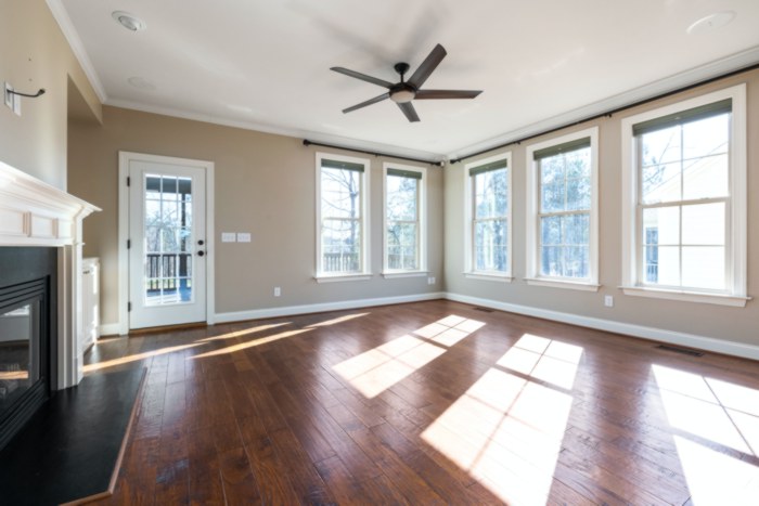 Clean hardwood floors in an empty room