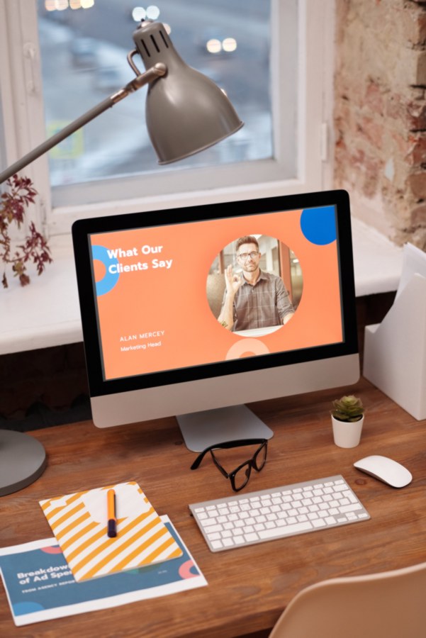Open laptop with view of screen saying what our clients say