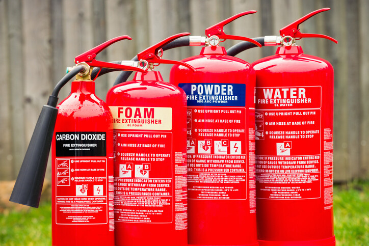 selection of different fire extinguishers