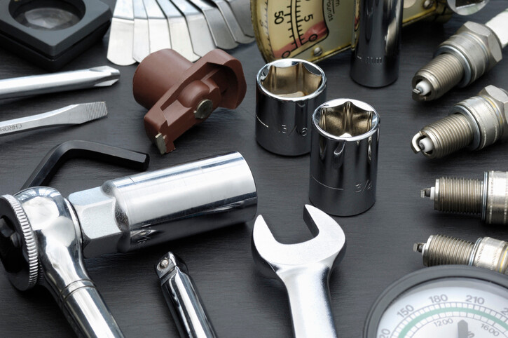 Torque wrench and other tools on workbench