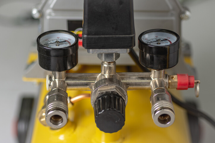 yellow air compressor with two valves